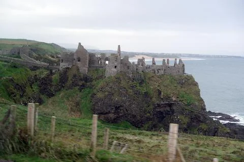 Medieval Dunluce Castle Ruins on Dramatic Northern Ireland Cliff Stock Photos
