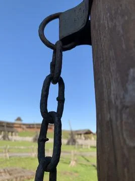 Medieval execution weapon. Chain with shackles for torture. Ancient Instrumen Stock Photos