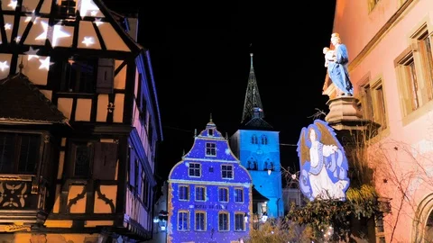 Medieval facade decorated with colored LED at night Stock Footage 124484991