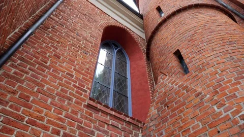 Medieval Gothic Church Structure and Ornate Brick Facade Stock Footage 345086986