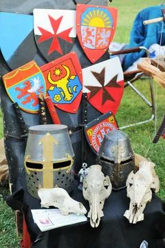 Medieval helmets and shields Stock Photos