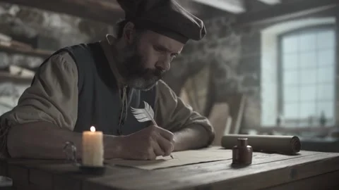 A medieval inventor shading a geometric sketch on paper with a quill pen Video stock 341009860