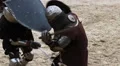 Medieval knight tournament, opponents fighting until referee stops the battle HD Footage