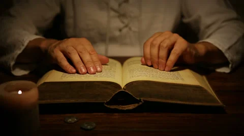 Medieval looking man is reading a old book and lifts thumb up Video stock 29845078