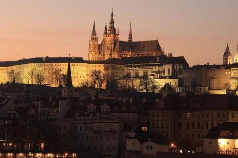Medieval Prague Castle complex over the Vltava River, night scene Stock Photos