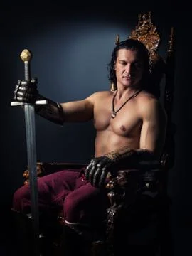 Medieval Prince on the throne Stock Photos