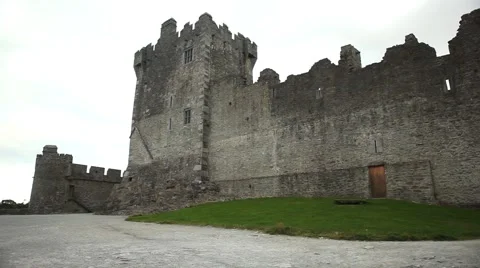 Medieval Ross Castle in Kerry, Ireland beside beautiful lake at dawn Stock Footage 45124231