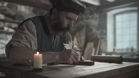 Medieval scholar drawing a straight line with a quill pen using a wooden square Stock Footage 340502660