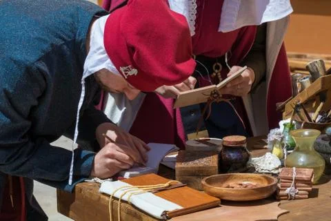 Medieval scribes  writing calligraphy Stock Photos