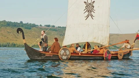 Medieval Ship with Vikings on Board Sails in the Middle of the River Video stock 163964094