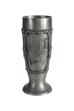 Medieval silver goblet isolated with bas-relief on a white background. Stock Photos