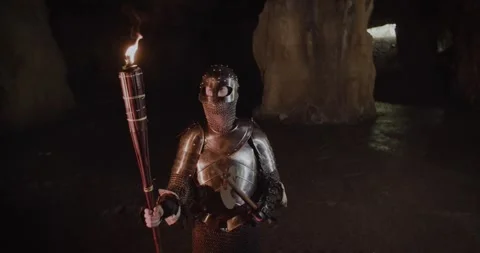 Medieval soldier Cave Exploration Stock Footage 247790948