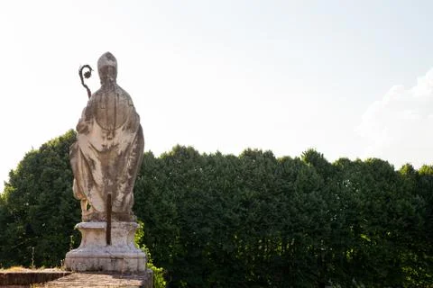 Medieval Statue of a Bishop Looking at Copy Space Stock Photos