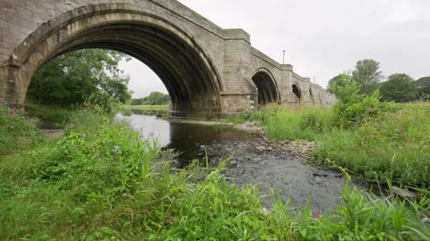 Medieval stone bridge over the River Dee, in the city of Aberdeen, Scotland. Stock Footage 249305472