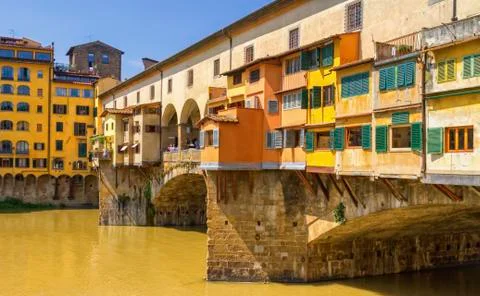 Medieval stone bridge Ponte Vecchio over Arno river in Florence, Tuscany, Italy Stock Photos