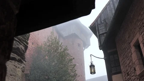 Medieval stone castle keep with terrifying fog Stock Footage 124481975
