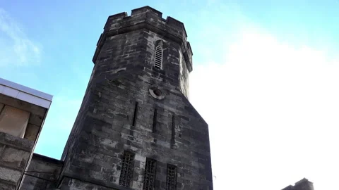 Medieval style tower with parapet at Eastern State Penitentiary. 動画素材 163482211