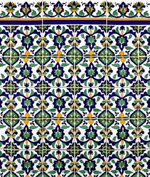 Medieval tiles Oriental style pattern tiles on outside wall Copyright: xZo... Stock Photos