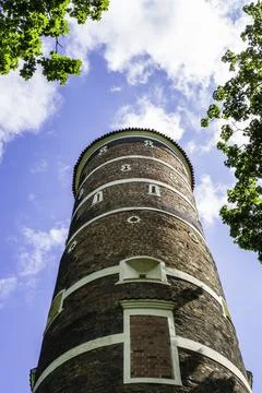 Medieval Tower with Clouds and Blue Sky in Panemune, Lithuania Stock Photos