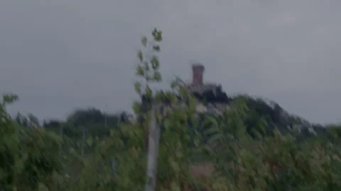 Medieval tower view through parked car window, Italy.part-1 Stock Footage 345342320