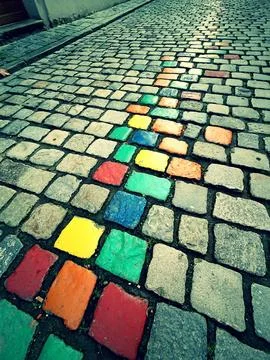 Medieval walking path or road walkway constructed with old cobble stone Stock Photos
