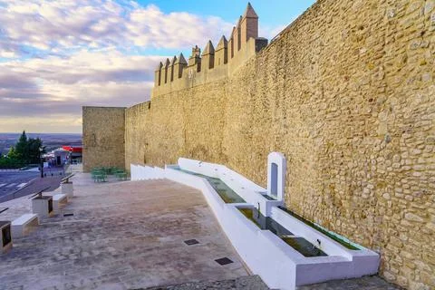 Medieval wall and source of fresh water in the picturesque town of Medina 스톡 사진