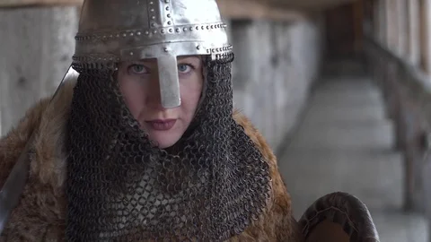 Medieval warrior glance in camera in slow-mo flat image Stockbeeldmateriaal 89121125