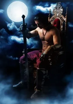 Medieval warrior on the throne on background of the moon Stock Photos
