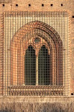Medieval window with grate Stock Photos