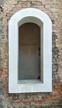 Medieval window with a rounded shape Stock Photos