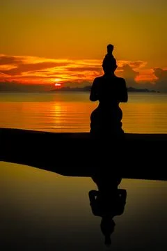 Meditate at sunset Stock Photos