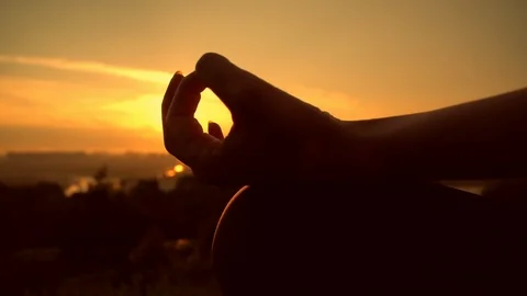 Meditate. Touch the sun Stock Footage 96427062