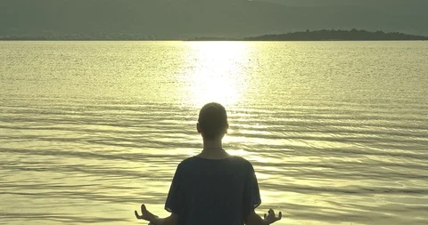 Meditating By The Ocean Stock Footage 112405876