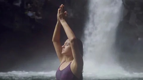  Meditating In The Tropical Waterfalls  Stock Footage 310018052