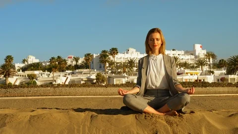 Meditating under the sun Stock Footage 106190466