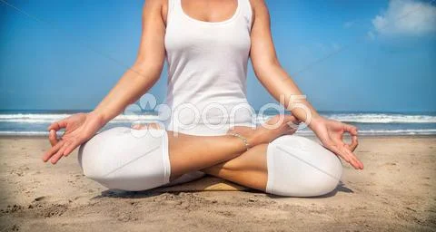 Meditation on the beach Stock Photos