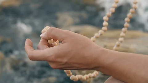 Meditation on the beads Stock Footage 81852908