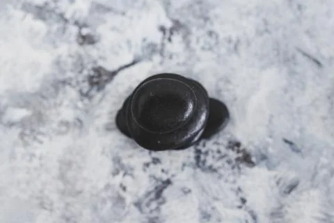 Meditation inspired image with  stack of zen pebbles on grey concrete surface Stock Photos