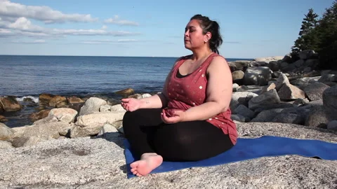 Meditation by the ocean Stock Footage 135765474