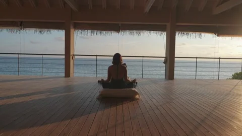 Meditation at ocean pavilion Stock Footage 329965708