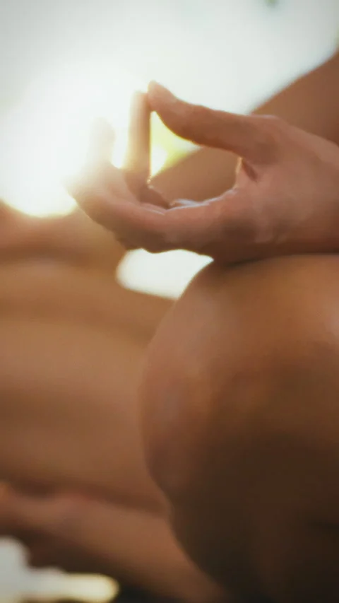 Meditation practice in a calming indoor space with morning light illuminatin Stock Footage 331666165