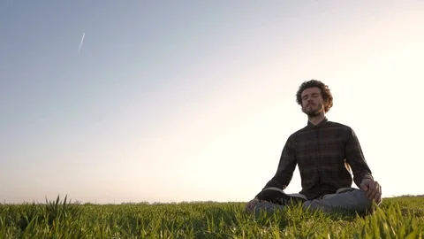 Meditation in spring fields Stockbeeldmateriaal 88414204