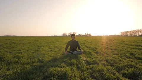 Meditation in spring fields Stock Footage 88414278