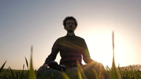 Meditation in spring fields Stockbeeldmateriaal 88414310