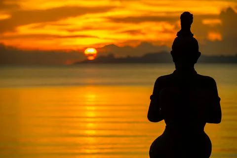 Meditation at sunset Stock Photos