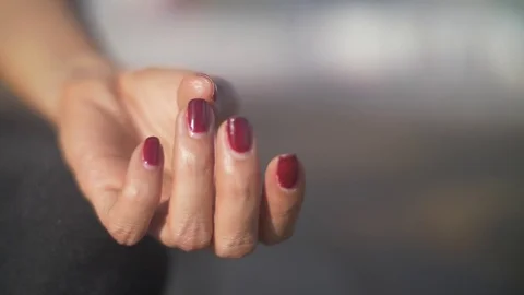Meditative hand posture, with red fingernail polish, close up. Stock Footage 85012936