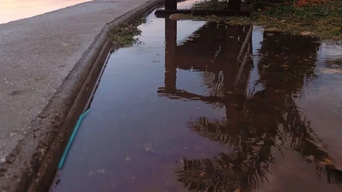 A meditative shot of a bench reflection in the sunset Video stock 103476888