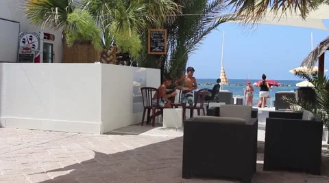 Mediterranean beach bar in the summer Stock Footage 60888699