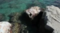 Mediterranean coast with reef rocks in Coral Bay, Paphos, Cyprus HD Footage
