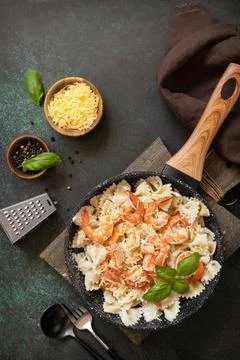 Mediterranean cuisine, seafood diet, italian cuisine. Pasta farfalle with gri Stock Photos